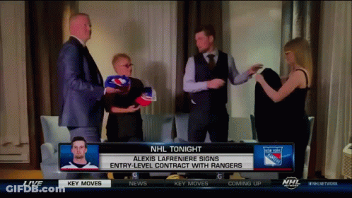 Group Standing In Front Of NHL Tonight Sign GIF