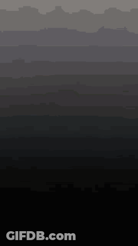 Group Standing In Front Of Onic Sign GIF