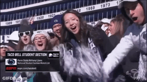 Group Standing In Front Of Taco Bell Ad GIF