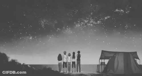 Group Standing In Front Of Tent Looking At Starry Sky GIF