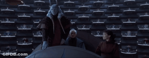 Group Standing In Front Of Wall Saying Order GIF