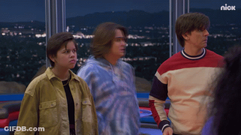 Group Standing In Front Of Window With Nick Logo GIF