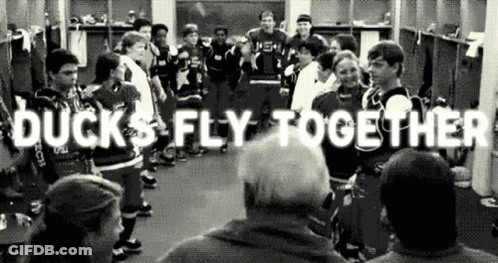 Group Standing In Locker Room Ducks Fly Together GIF