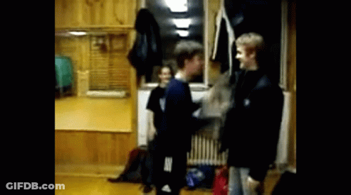 Group Standing In Room With Adidas Shirt GIF