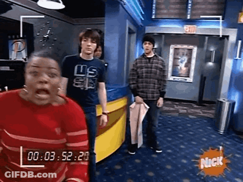 Group Standing In Room With Nick Logo GIF