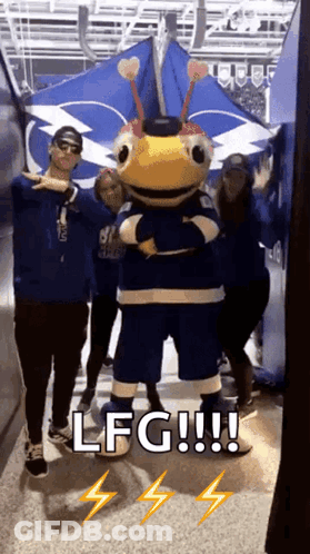 Group Standing Next To Mascot Saying LFG GIF