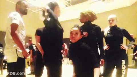 Group Standing Room With T.I. Shirt GIF
