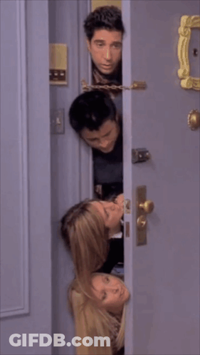 Group Sticking Heads Out Of Doorway GIF