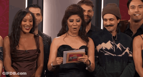 Group Surrounding Woman Holding Big Bro Sign GIF