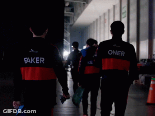 Group Walking Down Hallway Jacket Says Faker GIF
