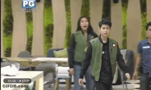 Group Walking In Room With PG Logo GIF