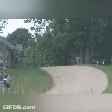 Group Walking On Dirt Road In Woods GIF