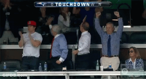 Group Watching Football Game Scoreboard Says Touchdown GIF