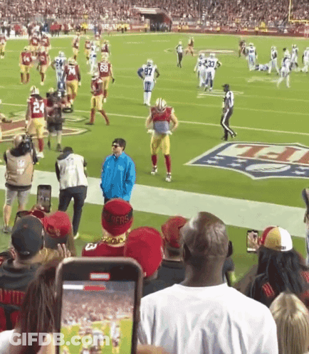 Group Watching Football With UCSD Hat GIF