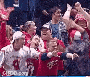 Group Watching Game Person In Red Jersey Number 10 GIF