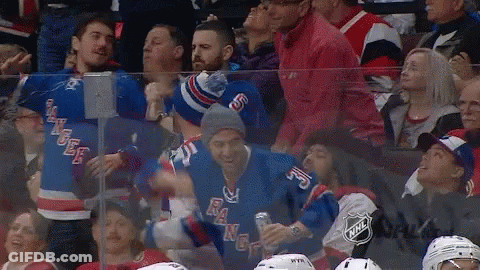 Group Watching Hockey Game With NY Jersey GIF