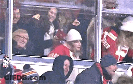 Group Watching Hockey, One In Jones Jersey GIF