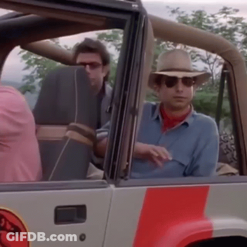 Group Watching Movie In Theater Saying Hello GIF