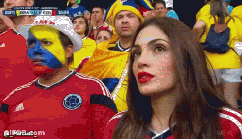 Group Watching Soccer With Colombian Flag Face Paint GIF