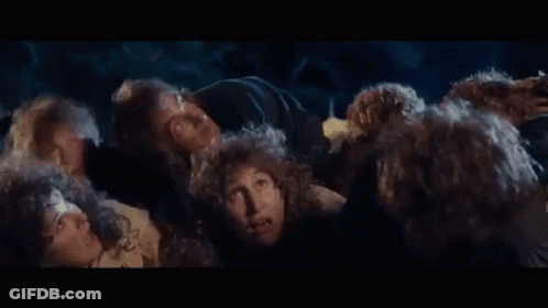 Group With Curly Hair Making Funny Faces GIF