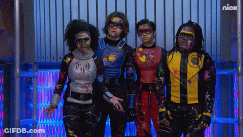 Group With Painted Faces In Front Of Nick Logo Wall GIF