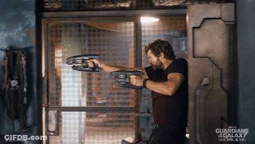 Guardians Of The Galaxy Poster Man Holding Gun GIF