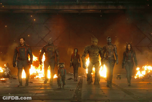 Guardians Of The Galaxy Standing In Front Of Fire GIF