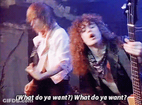 Guitarist Beside Man Saying What Do Ya Want GIF