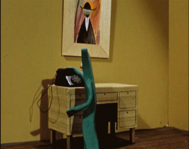 Gumby Cartoon Character Making Phone Call GIF