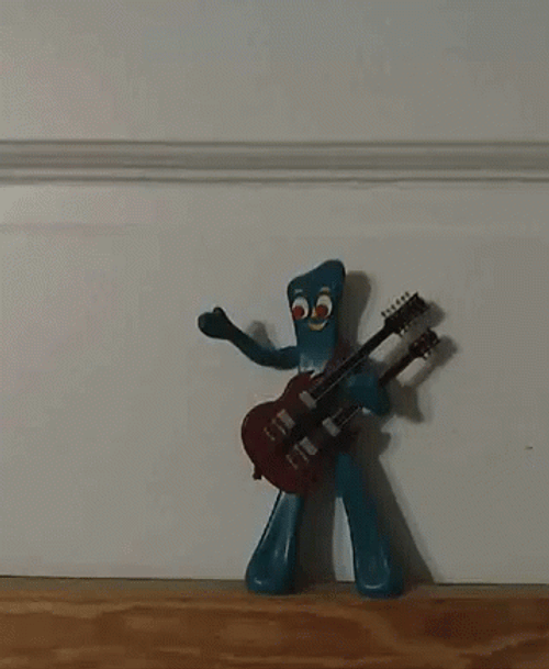 Gumby Cool Toy Holding Guitar GIF