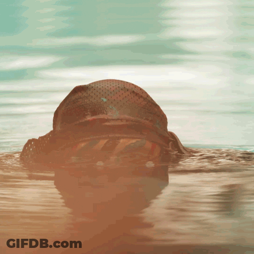 Gunner Biting His Gun In Water GIF