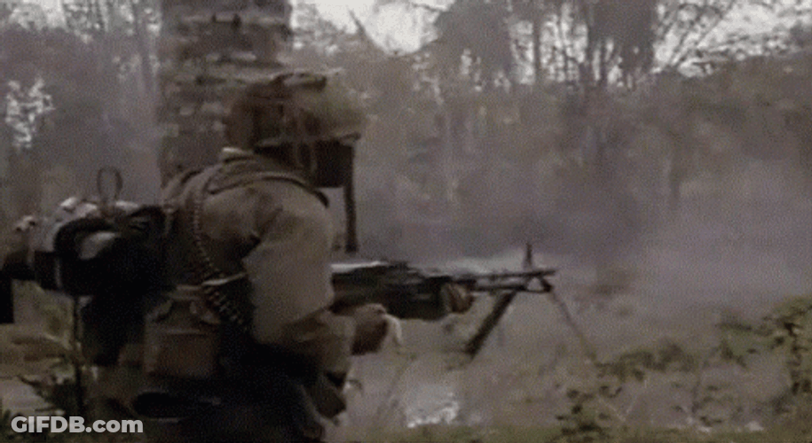 Gunner Shooting From Behind Of Coconut Tree GIF
