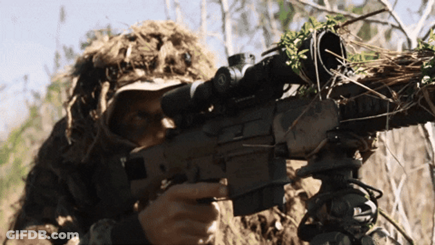 Gunner Shooting From The Bushes GIF