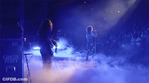 Guns N' Roses Performing On Stage In Front Of SR Box GIF