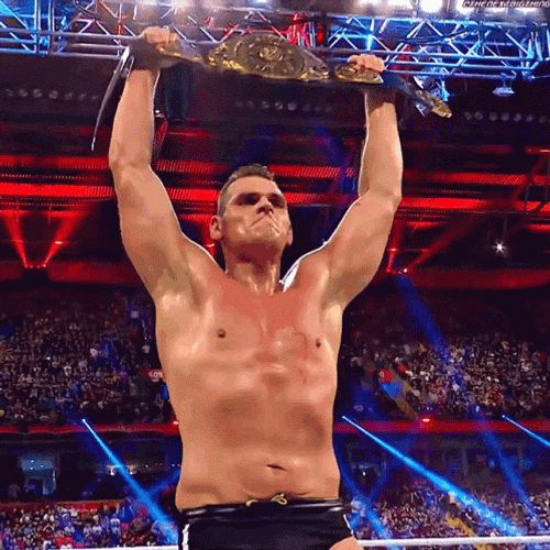 Gunther Flexing Championship GIF