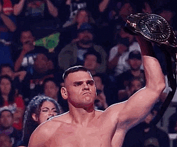 Gunther Raising Championship Belt GIF
