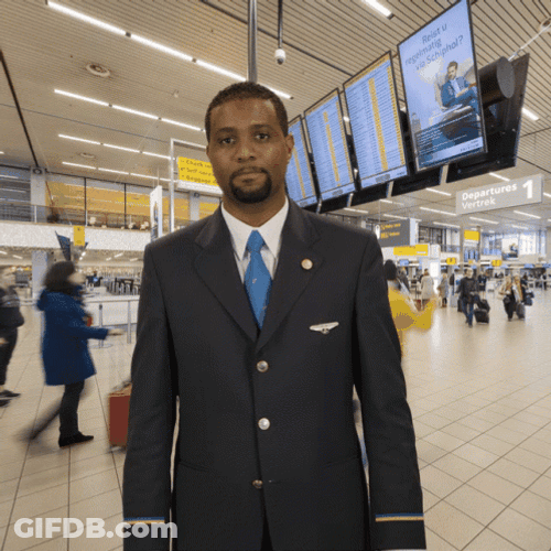 Guy Airport Personnel Checking Time GIF
