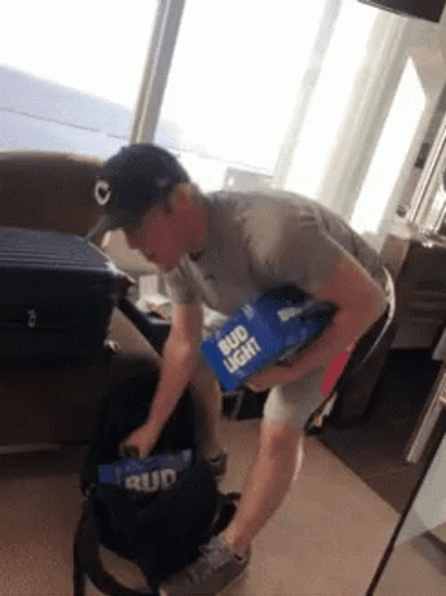 Guy Carrying Two Bud Light Boxes GIF