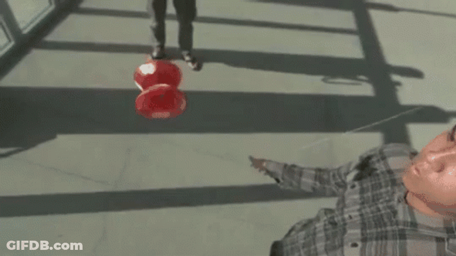 Guy Catching Yo Yo In The Air GIF