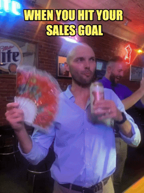 Guy Celebrates Hitting Sales Goal GIF