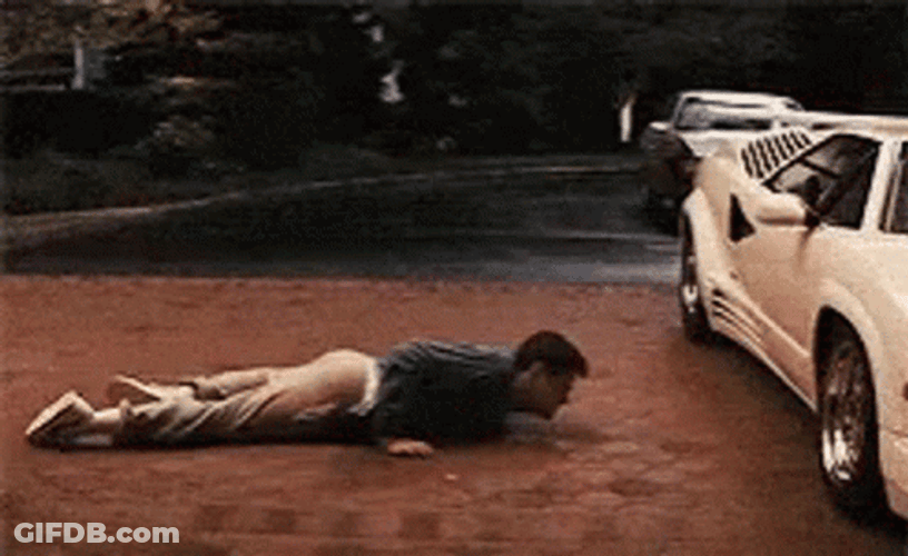 Guy Crawling Towards His Car GIF