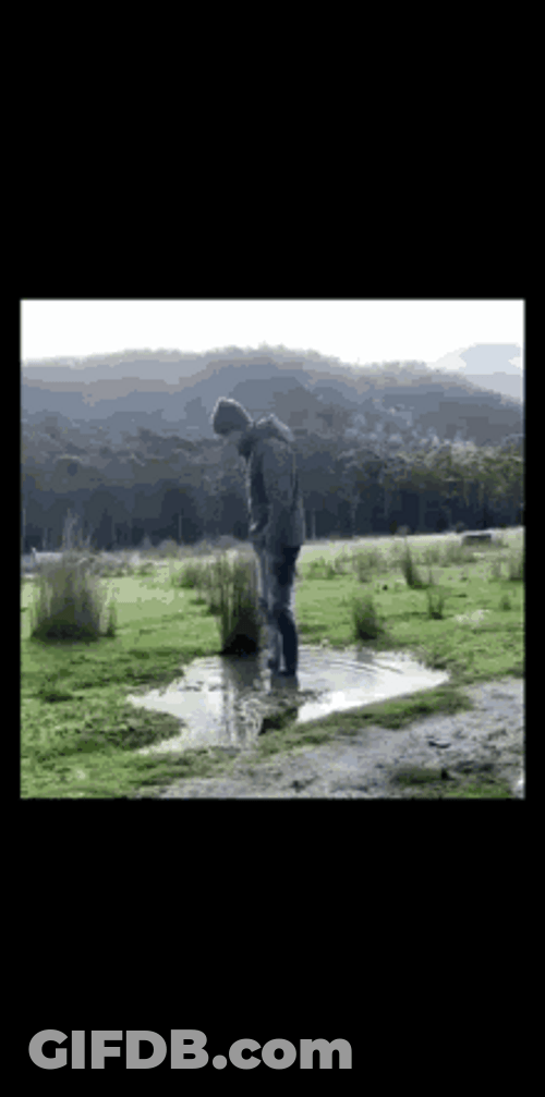 Guy Doing A Flip In A Puddle GIF