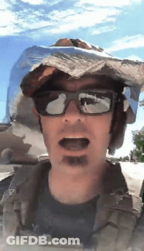 Guy Donning Tinfoil Hat Under The Sun GIF