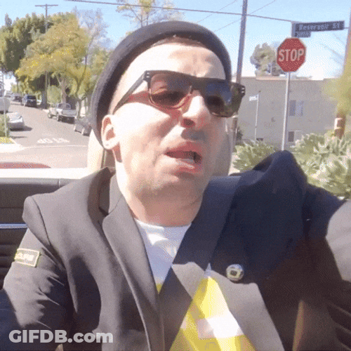Guy Driving Spits Blah Blah Blah GIF