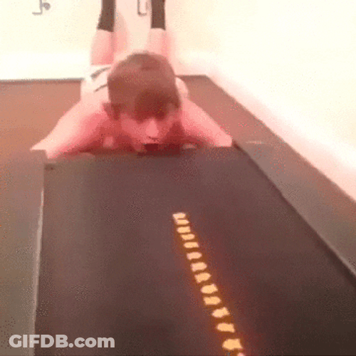 Guy Eating Crackers Treadmill GIF