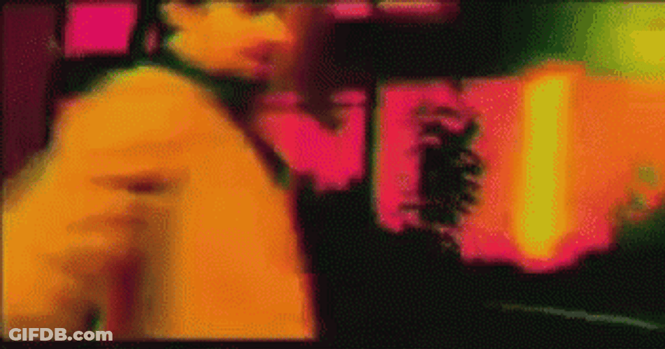 Guy Holding A Digital Video Disc GIF
