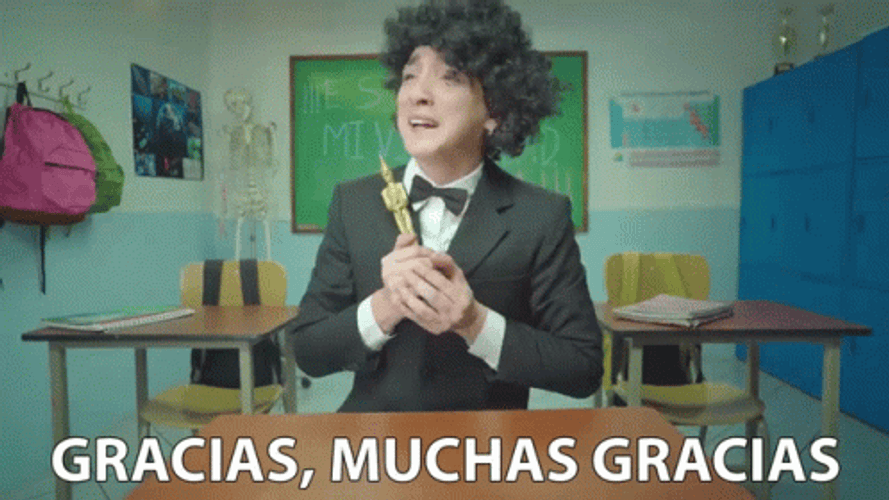 Guy Holding His Trophy Muchas Gracias GIF