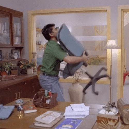 Guy In Green Dancing With Chair GIF