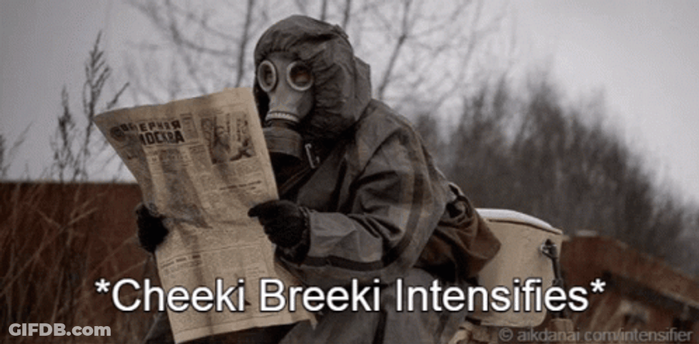 Guy In Hazmat Suit On Break Reading Newspaper GIF