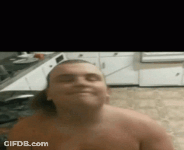 Guy In Mullet Shaking Head On Camera GIF